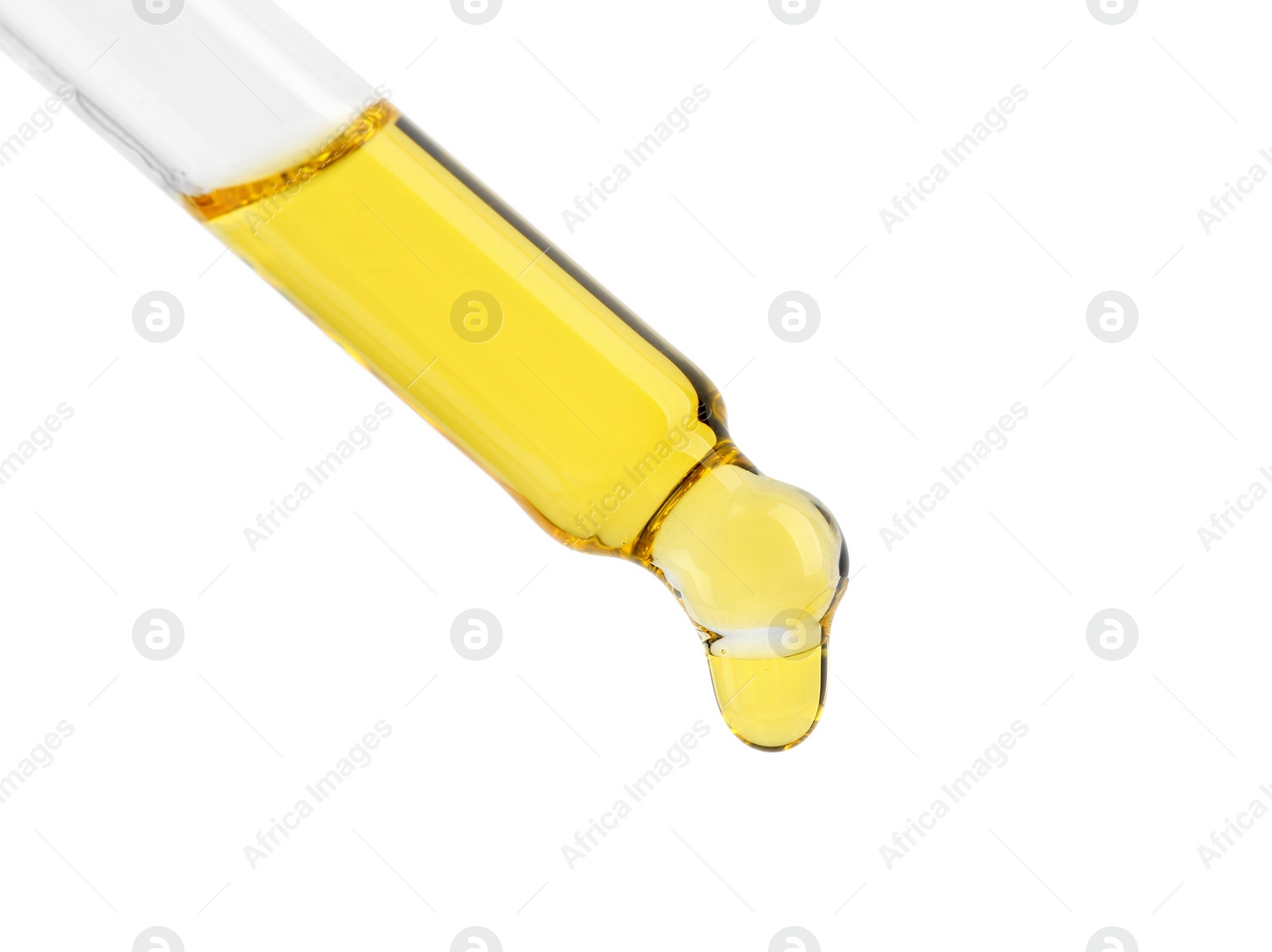 Photo of Dripping tincture from pipette isolated on white