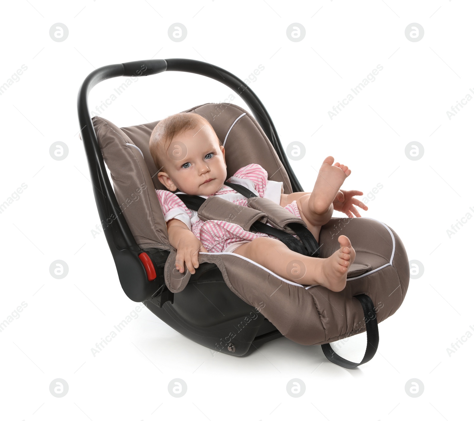 Photo of Adorable baby in child safety seat on white background