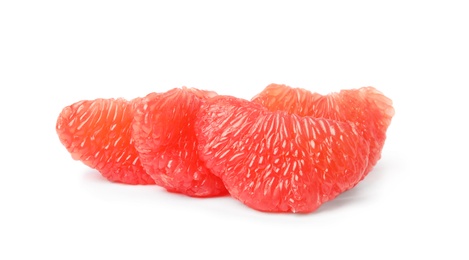 Slices of ripe juicy grapefruit on white background