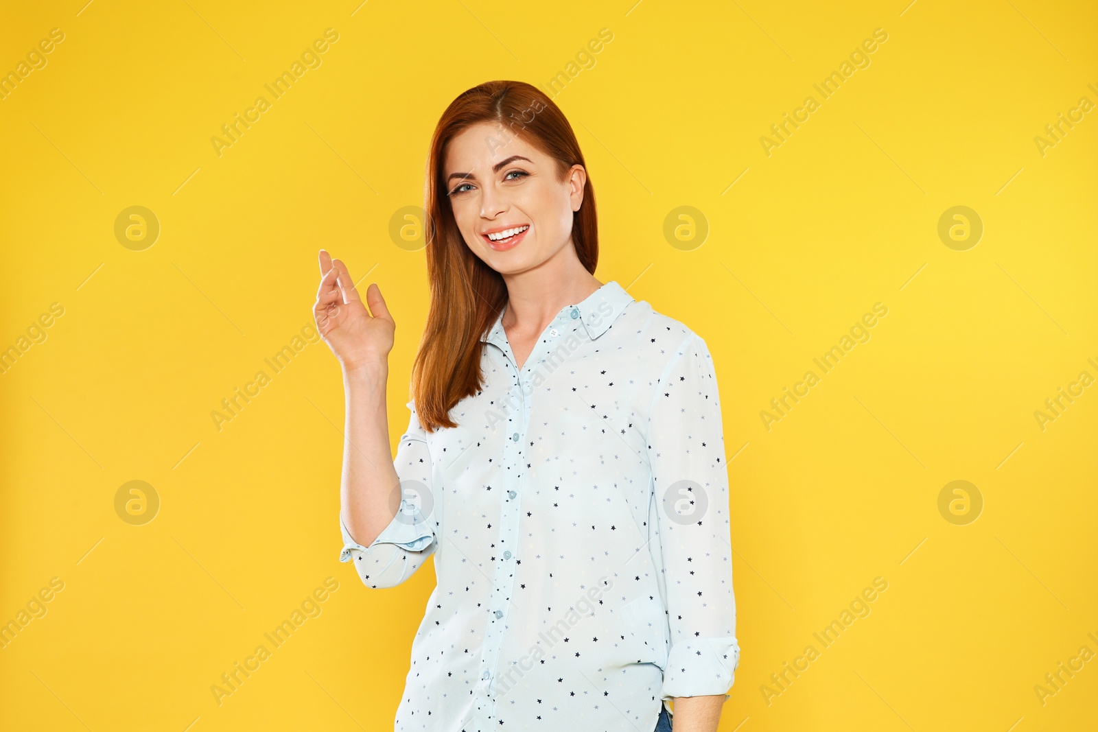 Photo of Portrait of beautiful woman on color background