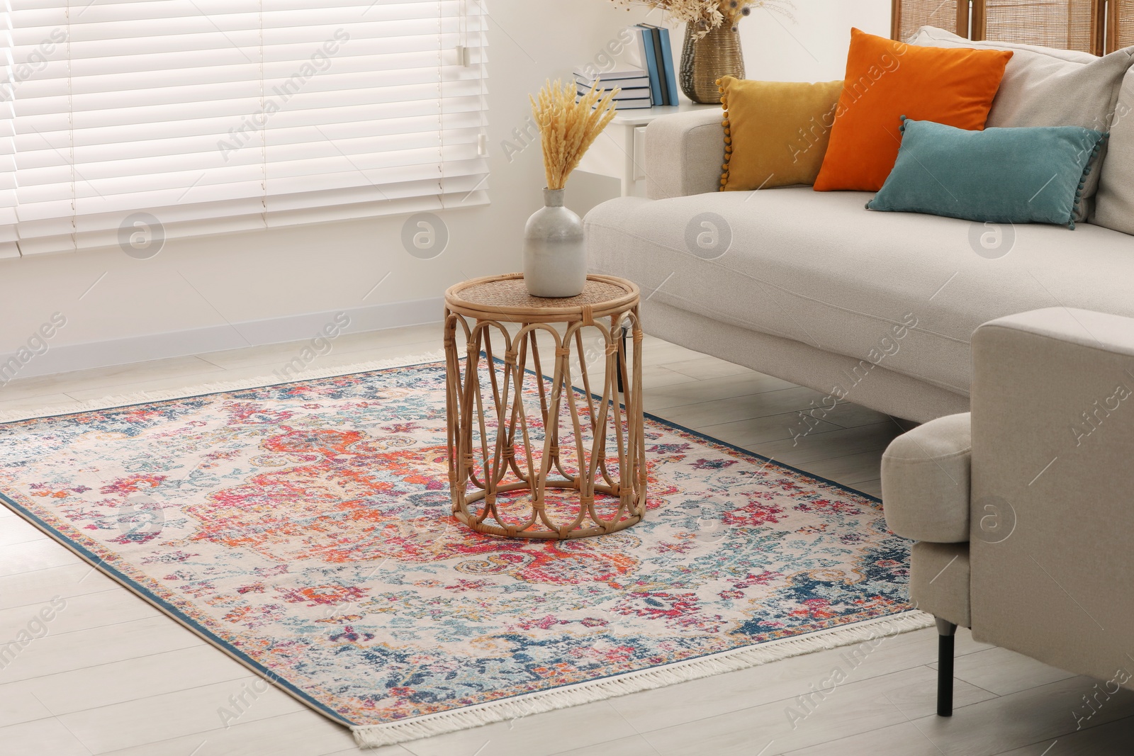 Photo of Stylish living room with beautiful carpet and furniture. Interior design