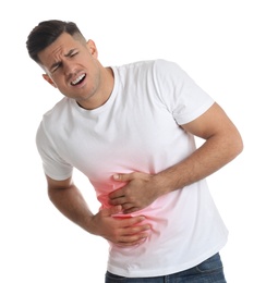 Man suffering from liver pain on white background