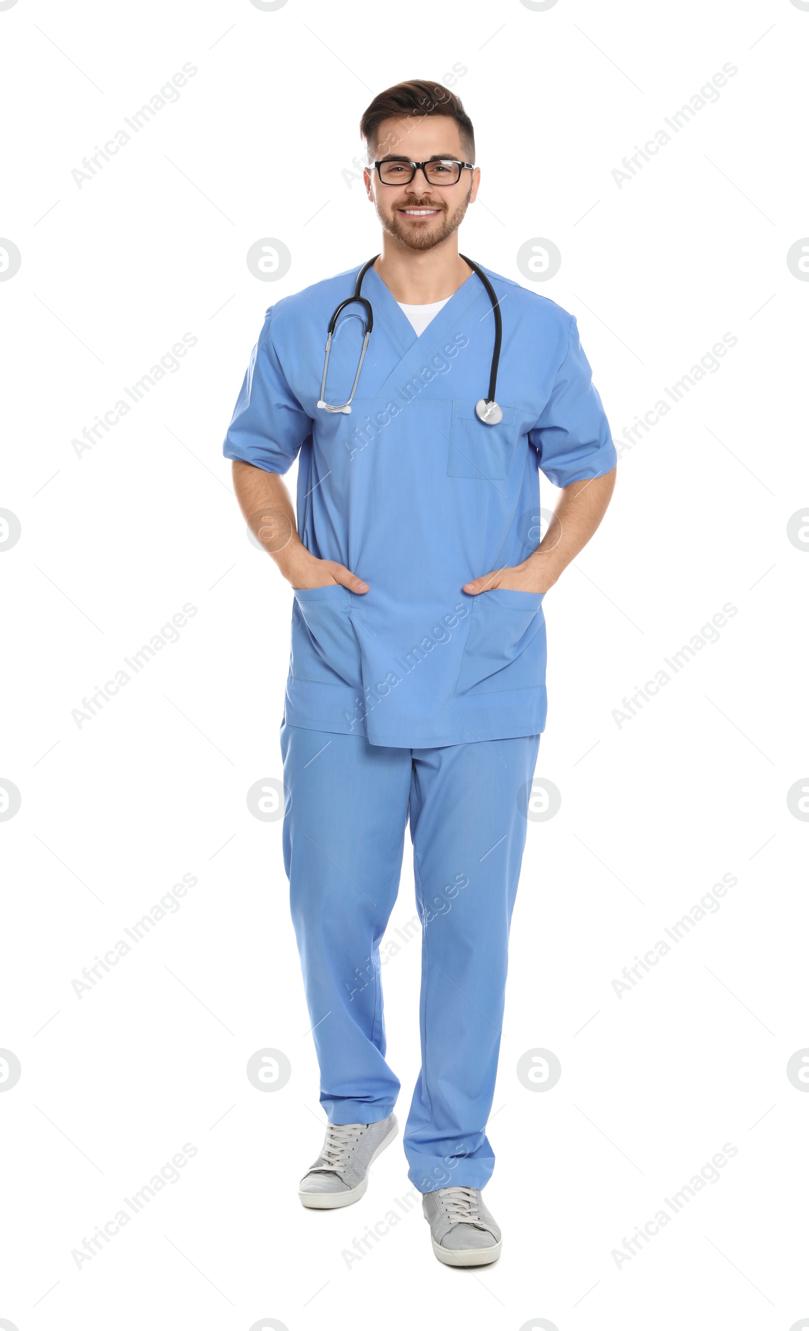 Photo of Full length portrait of medical doctor with stethoscope isolated on white