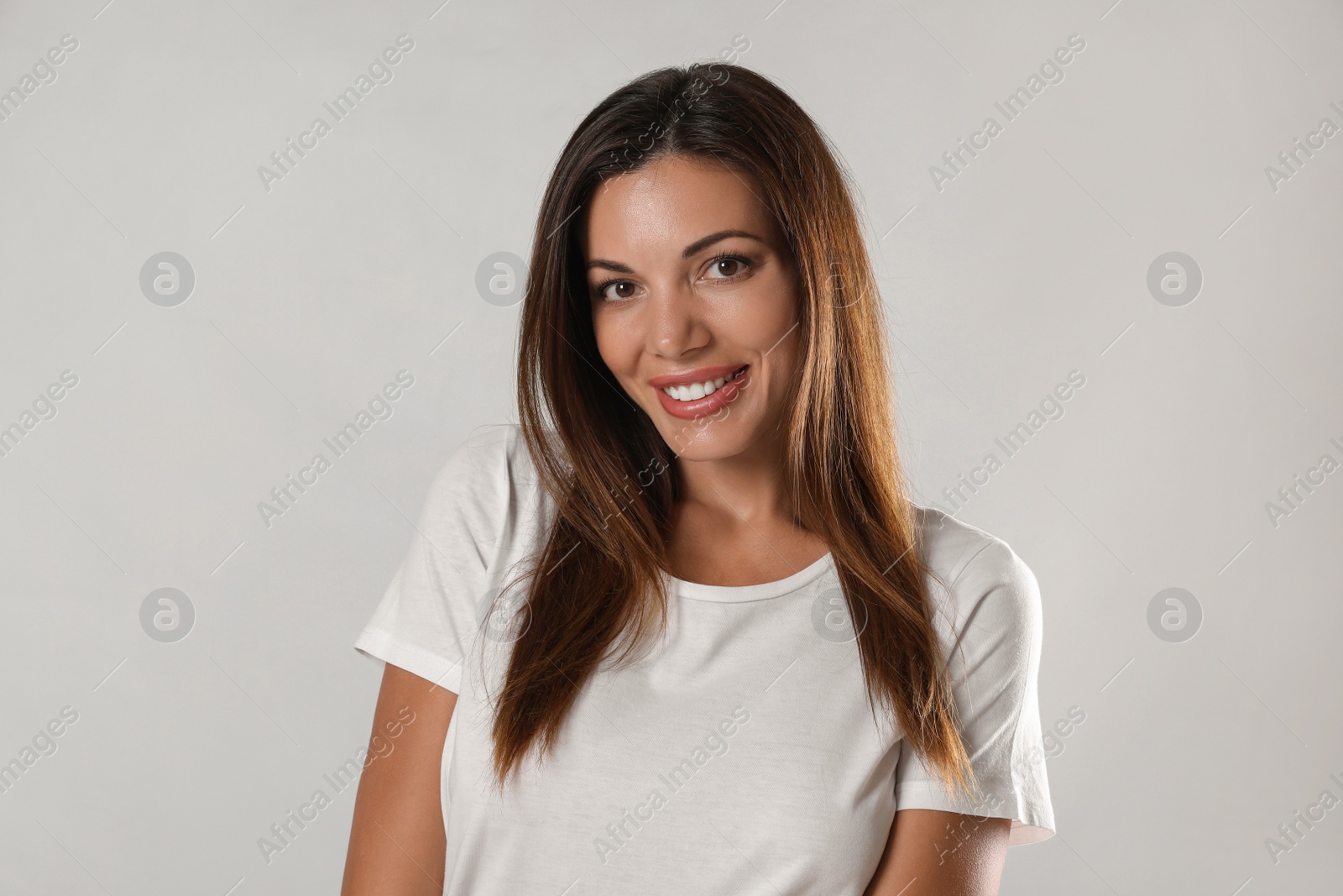 Photo of Portrait of beautiful woman on white background