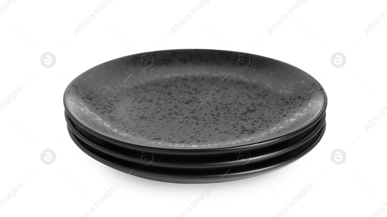 Photo of Three black ceramic plates isolated on white