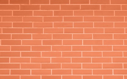 Image of Texture of coral color brick wall as background