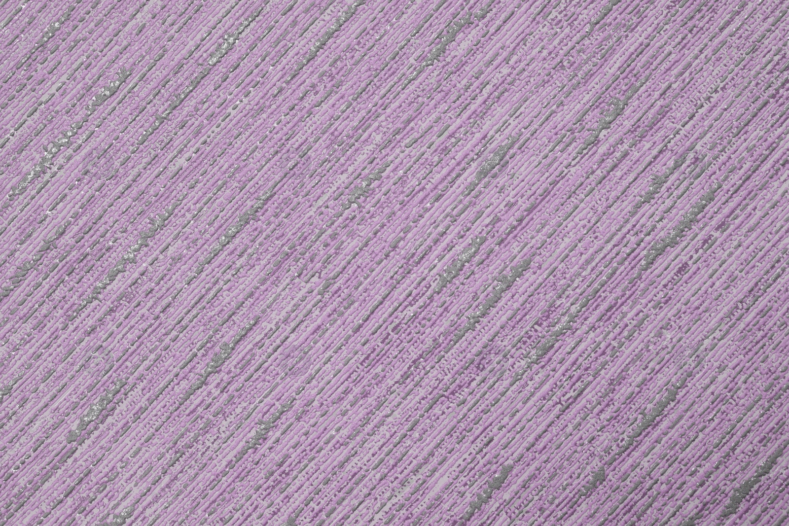 Image of Purple wallpaper sheet as background, top view