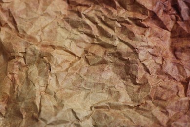 Texture of crumpled parchment paper as background, closeup