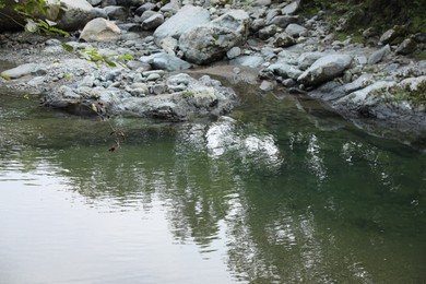 Beautiful view of small river and stones outdoors