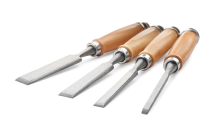 Photo of Modern chisels isolated on white. Carpenter's tools