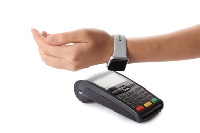 Photo of Woman using terminal for contactless payment with smart watch on white background