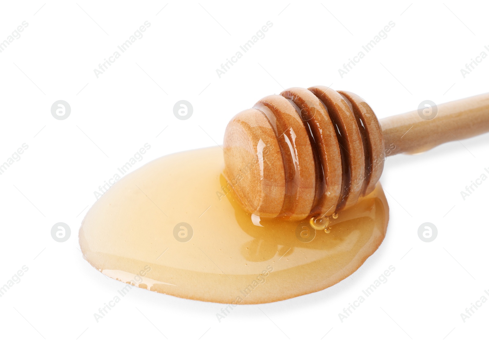 Photo of Delicious honey and dipper on white background