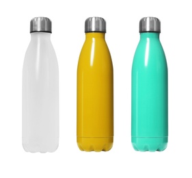 Image of Set of modern thermos bottles in different colors on white background 