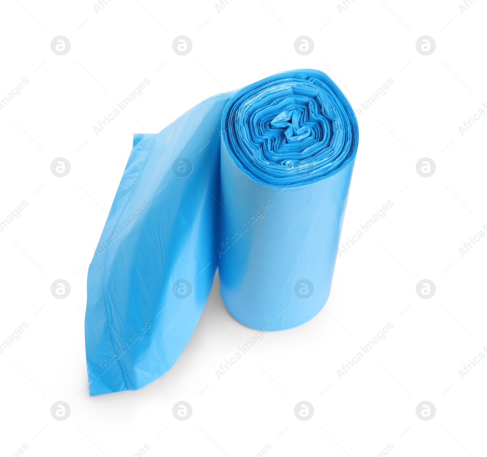 Photo of Roll of turquoise garbage bags on white background. Cleaning supplies