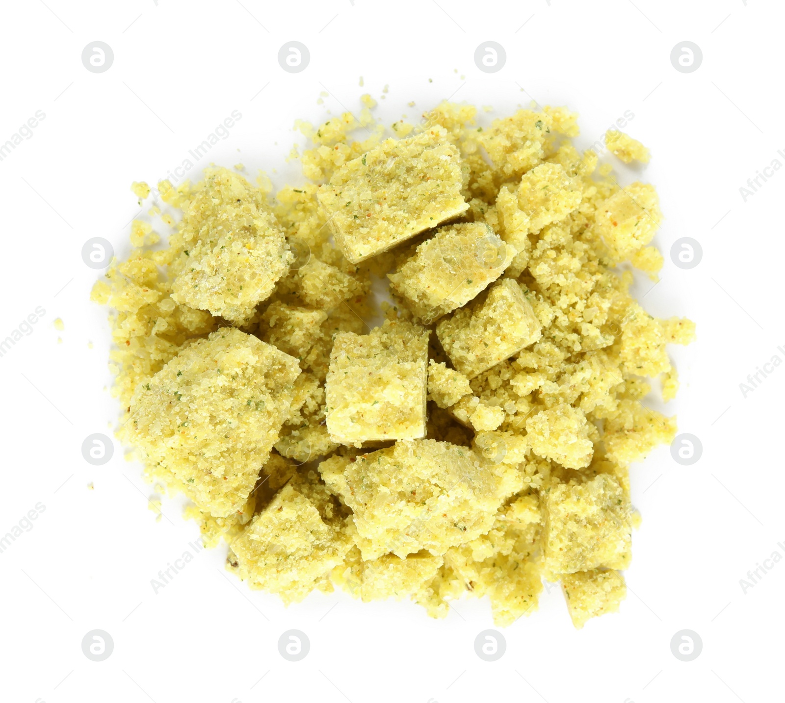 Photo of Aromatic crumbled bouillon cube on white background, top view