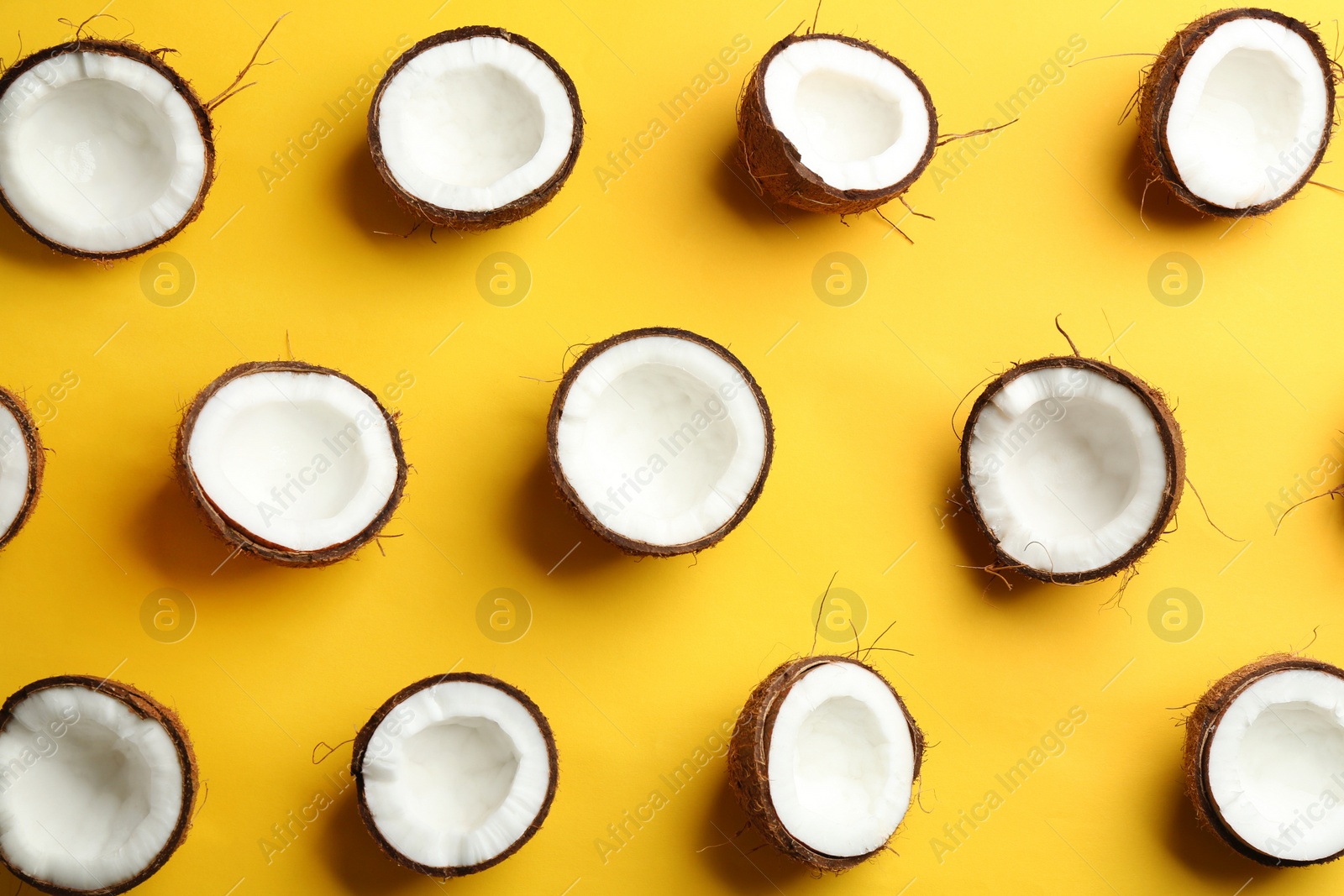 Photo of Coconut pattern on color background, flat lay