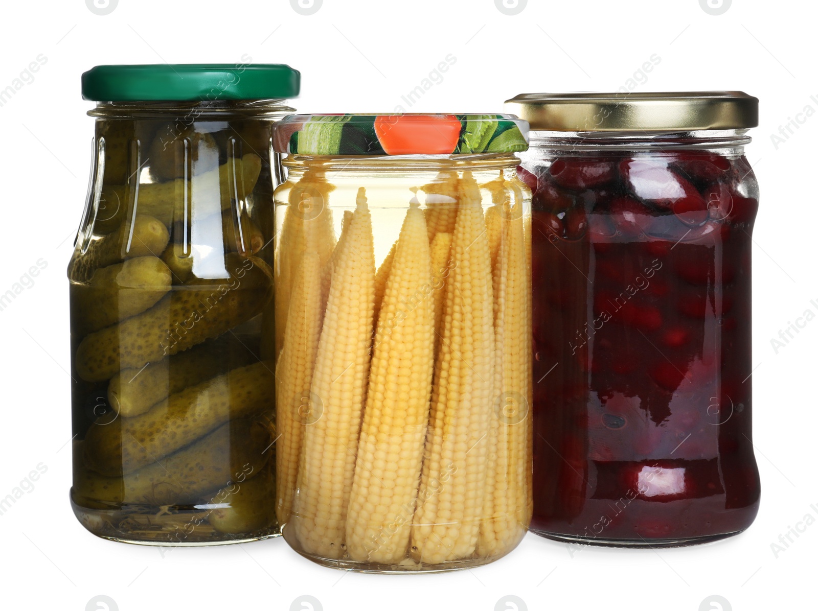 Photo of Glass jars of different pickled vegetables isolated on white