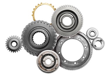 Set with different stainless steel gears on white background, top view