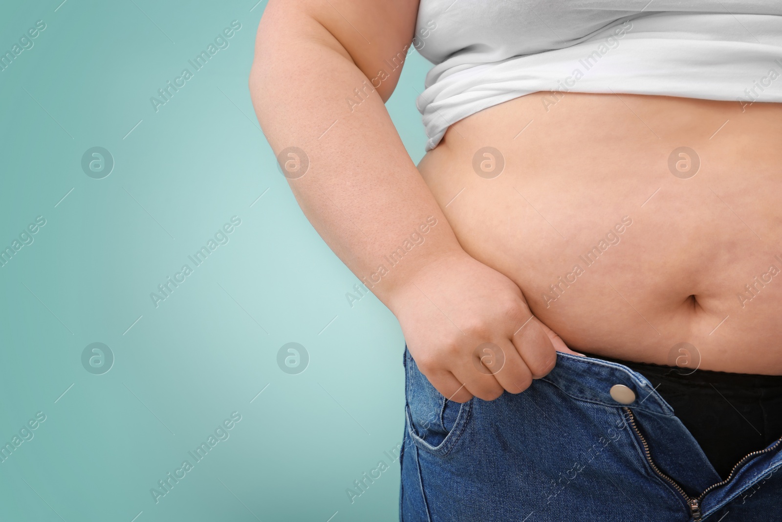 Photo of Overweight woman on color background