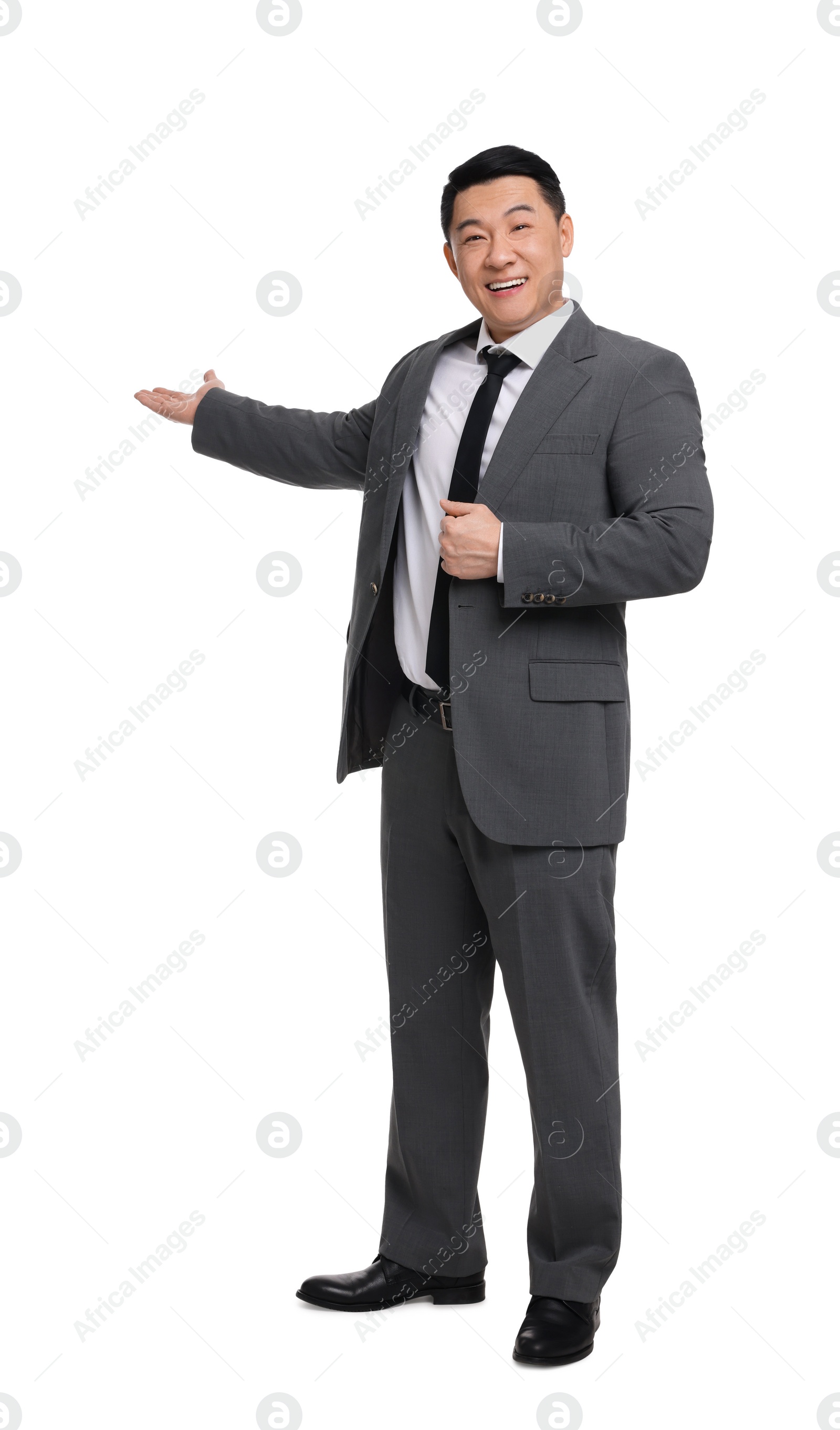 Photo of Businessman in suit posing on white background