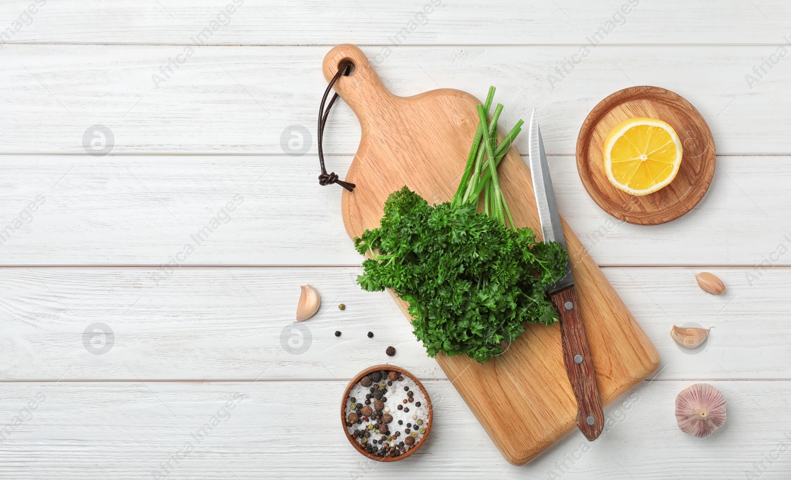 Photo of Flat lay composition with fresh green parsley on wooden background