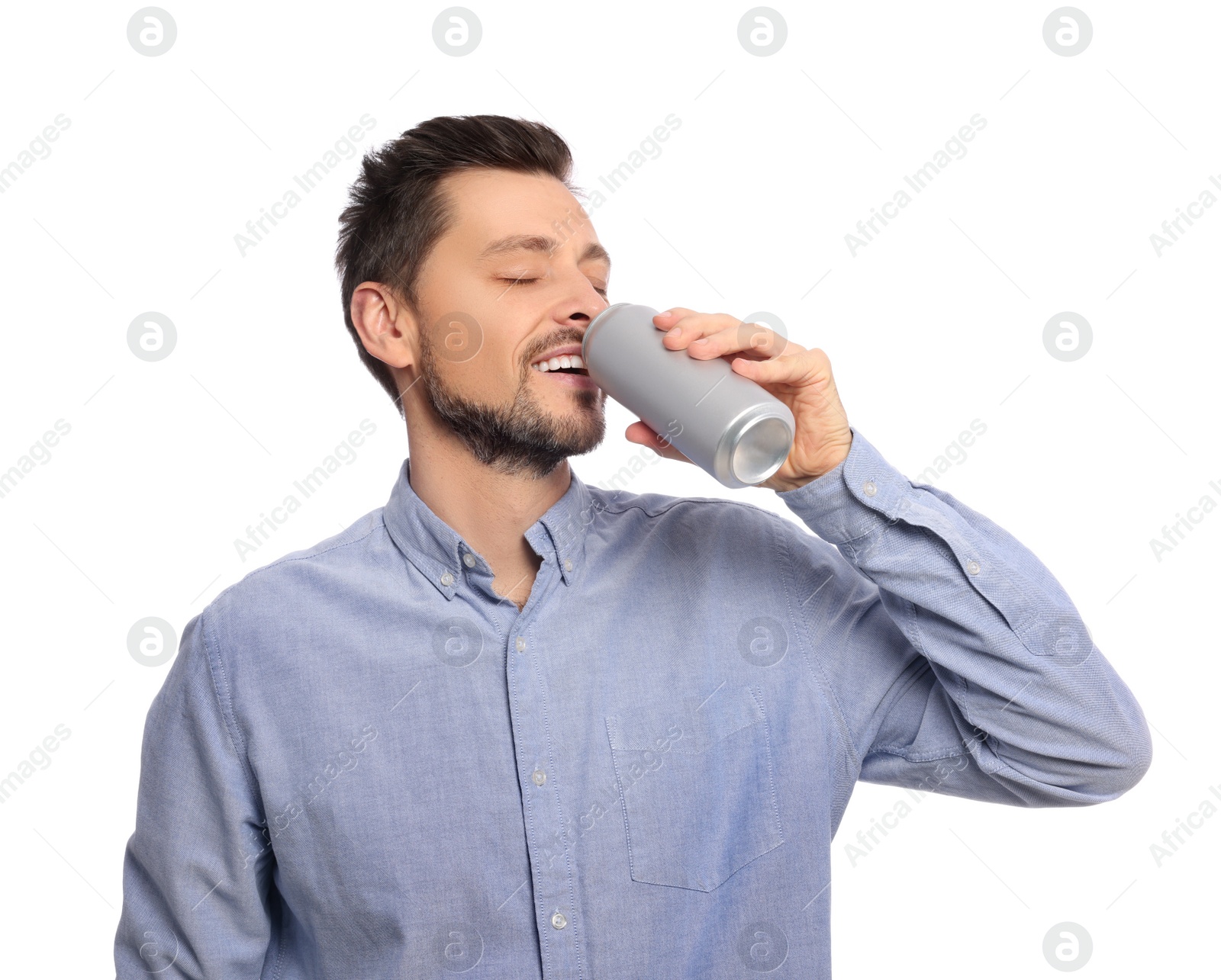 Photo of Happy man drinking from tin can on white background