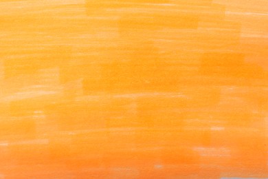 Photo of Abstract painting drawn with orange marker as background, top view