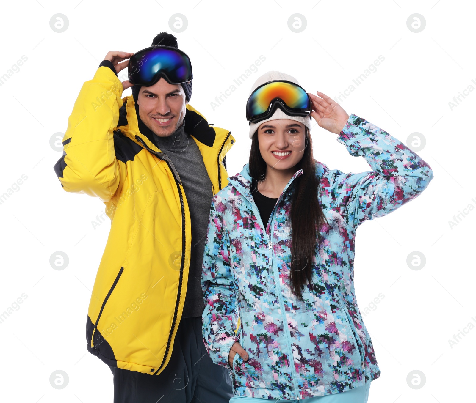 Photo of Couple wearing stylish winter sport clothes on white background