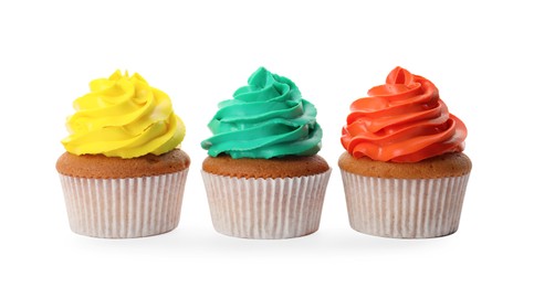 Different delicious colorful cupcakes on white background