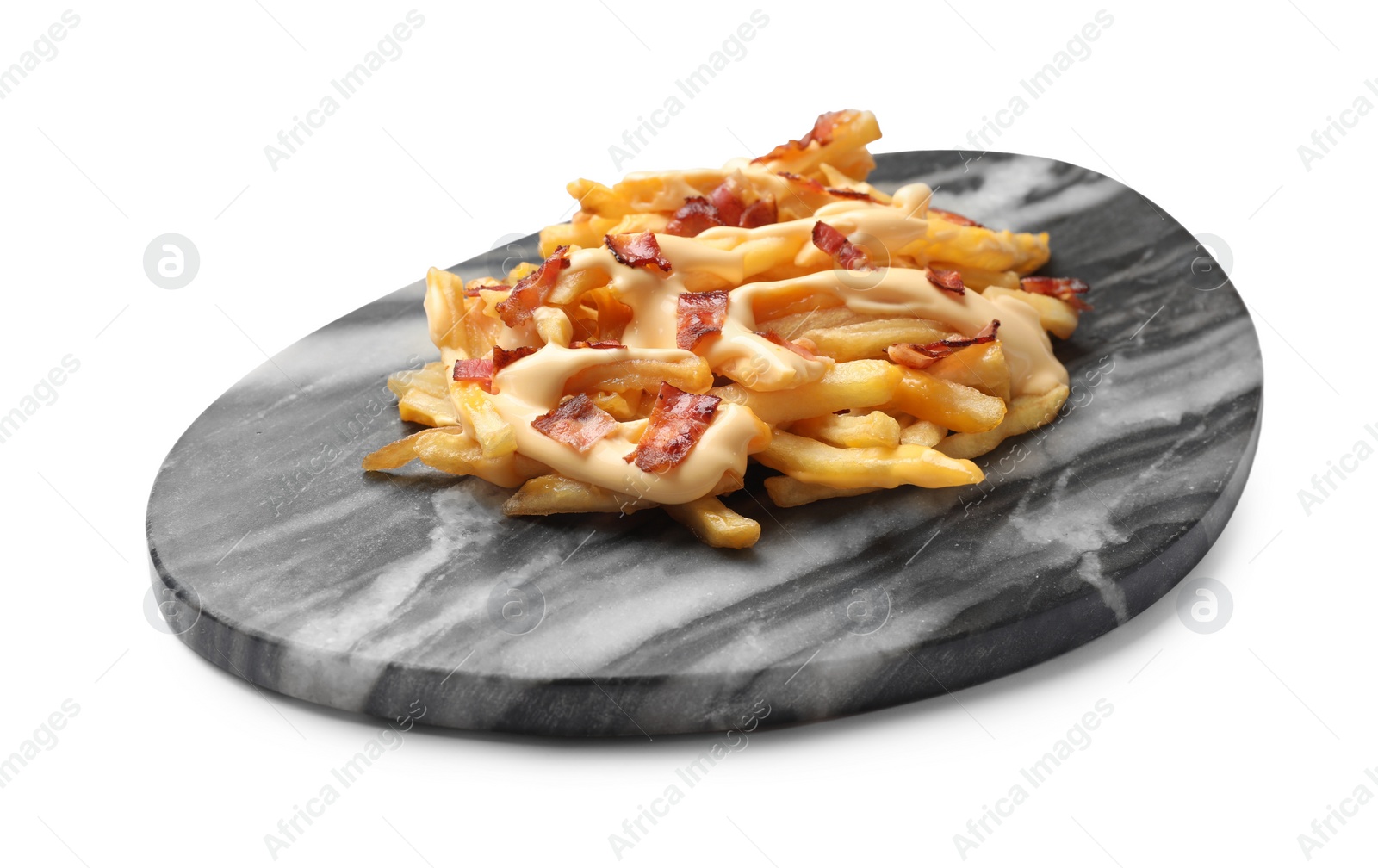 Photo of Delicious French fries with bacon and cheese sauce isolated on white