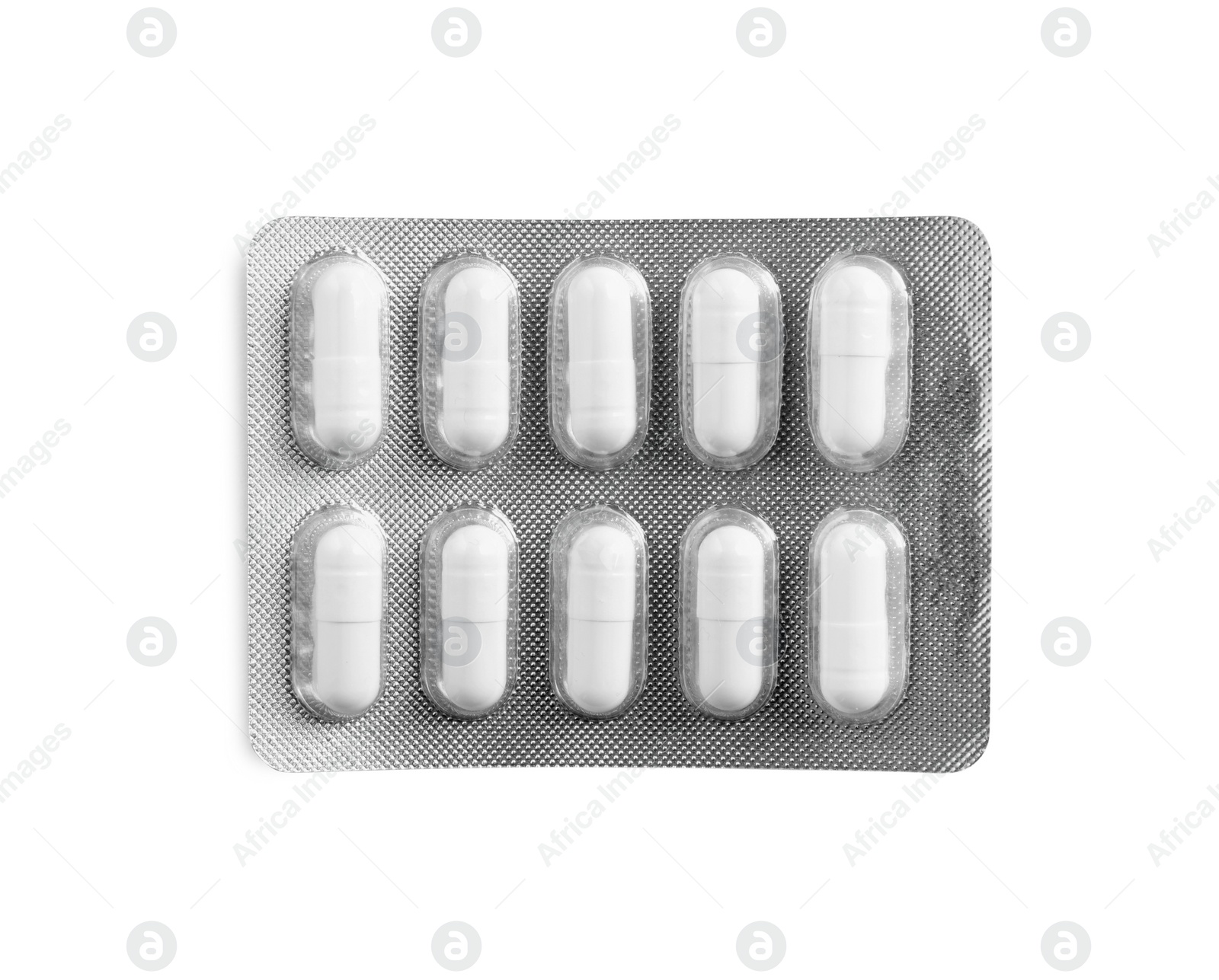 Photo of Blister of pills on white background, top view