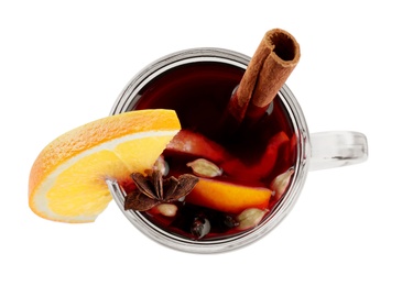 Photo of Aromatic mulled wine in glass cup isolated on white, top view