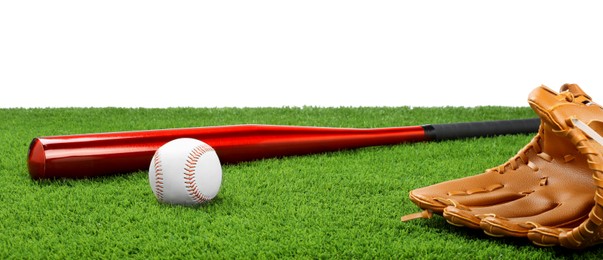 Photo of Baseball bat, ball and catcher's mitt on artificial grass against white background