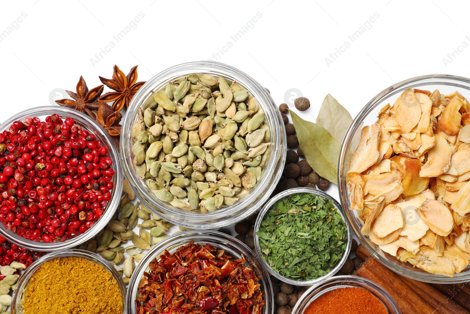 Photo of Bowls with different spices on white background, top view