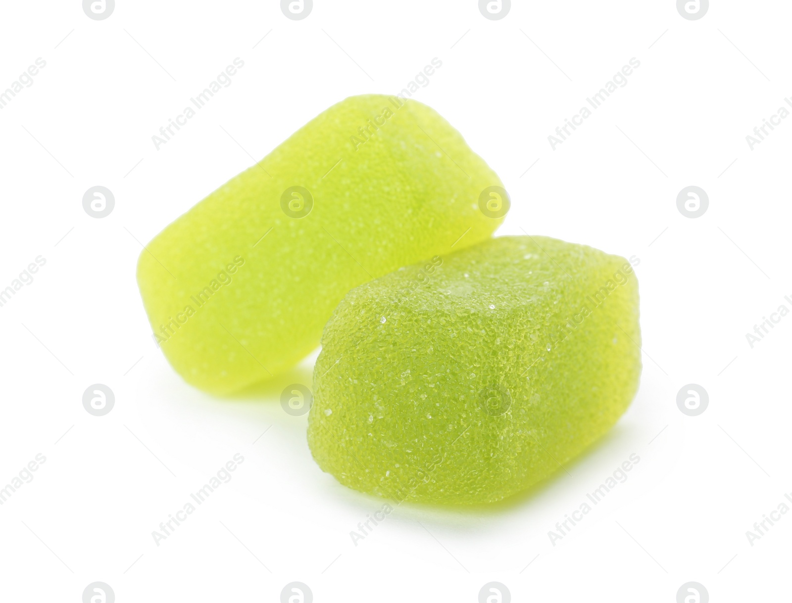 Photo of Bright delicious jelly candies on white background