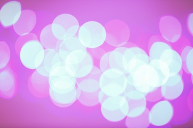 Photo of Beautiful glowing lights as background. Bokeh effect