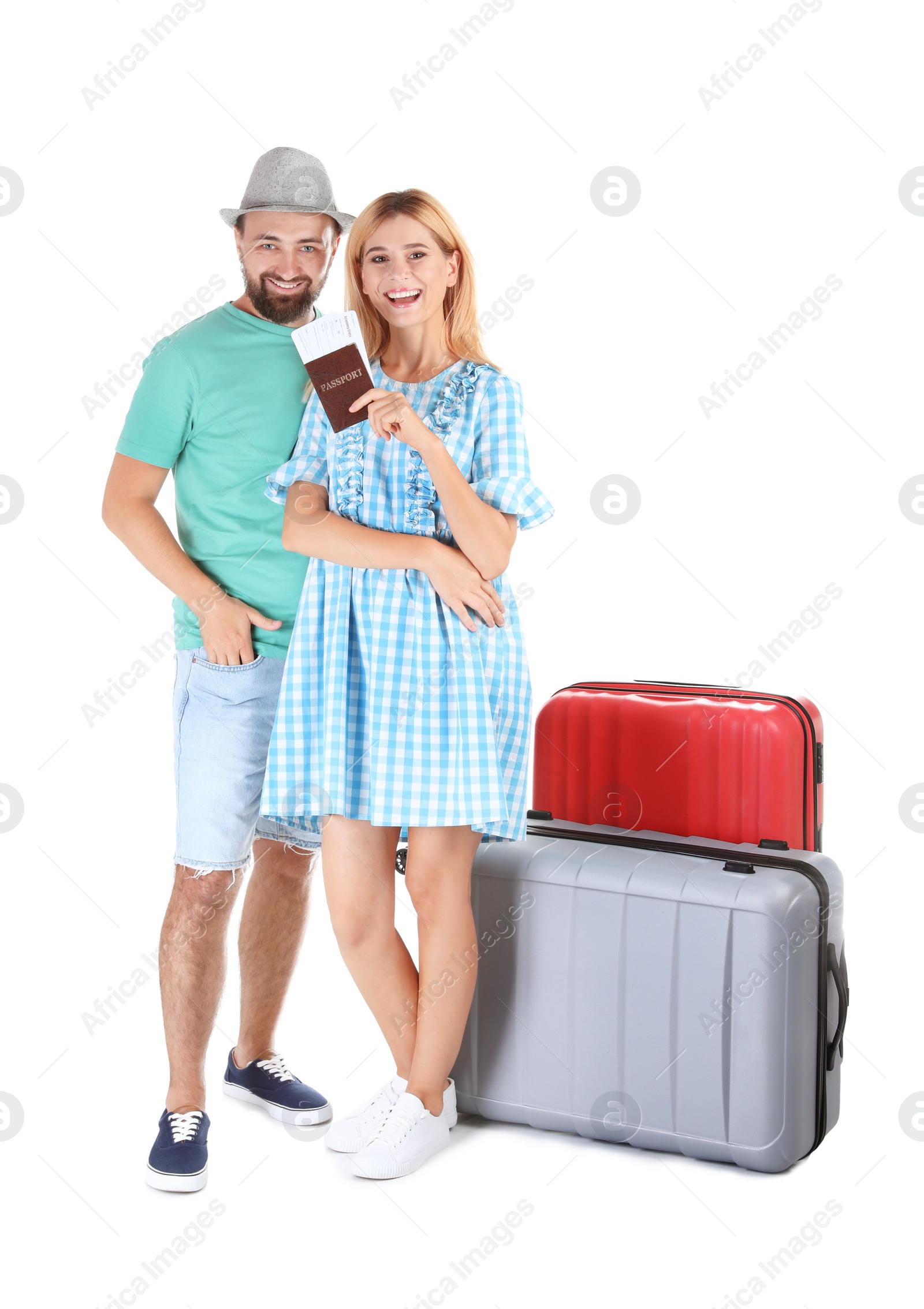 Photo of Couple with suitcases and passport on white background. Vacation travel