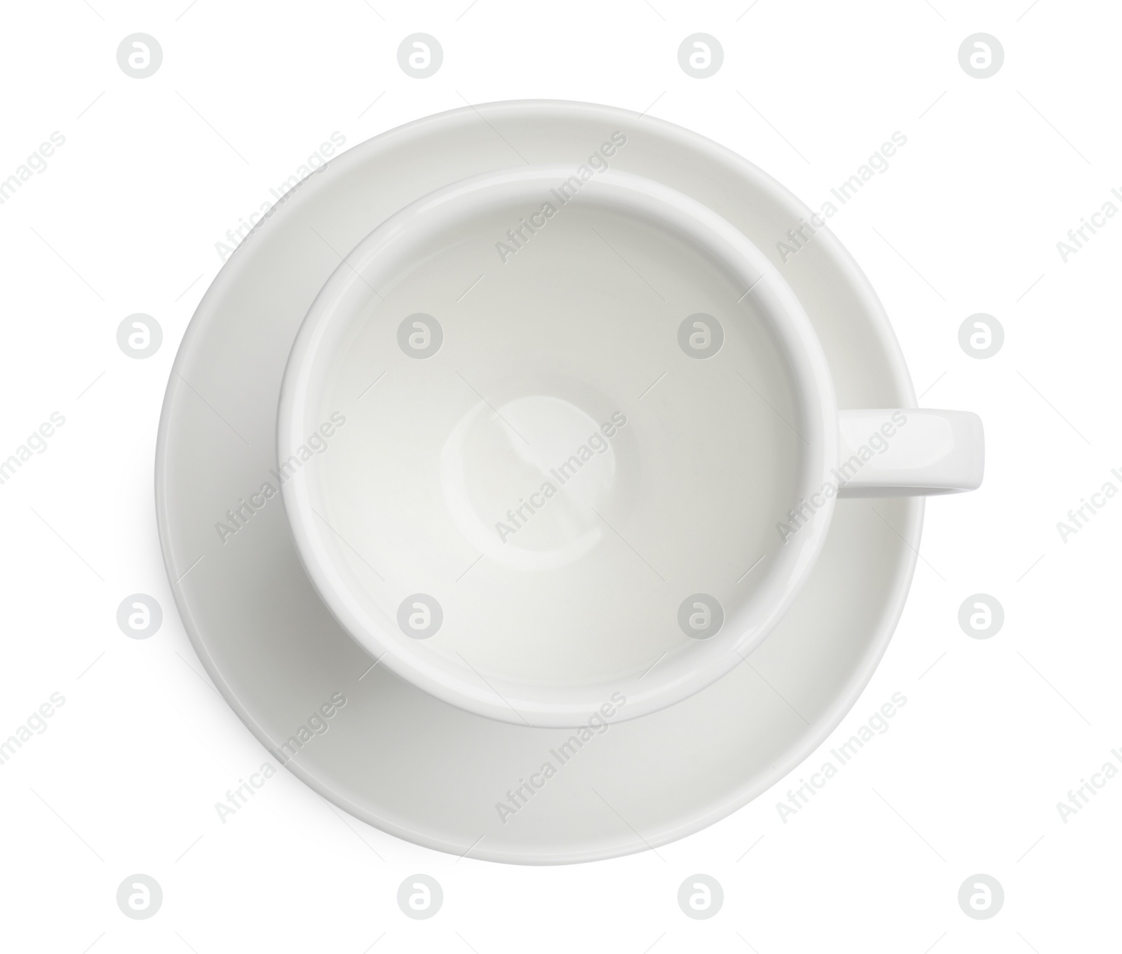 Photo of Ceramic cup and saucer isolated on white, top view