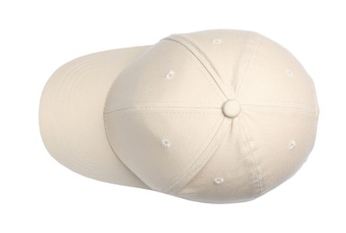 Photo of Stylish beige baseball cap isolated on white, top view