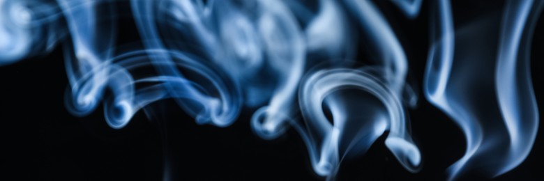 Image of Smoke on black background, closeup. Banner design