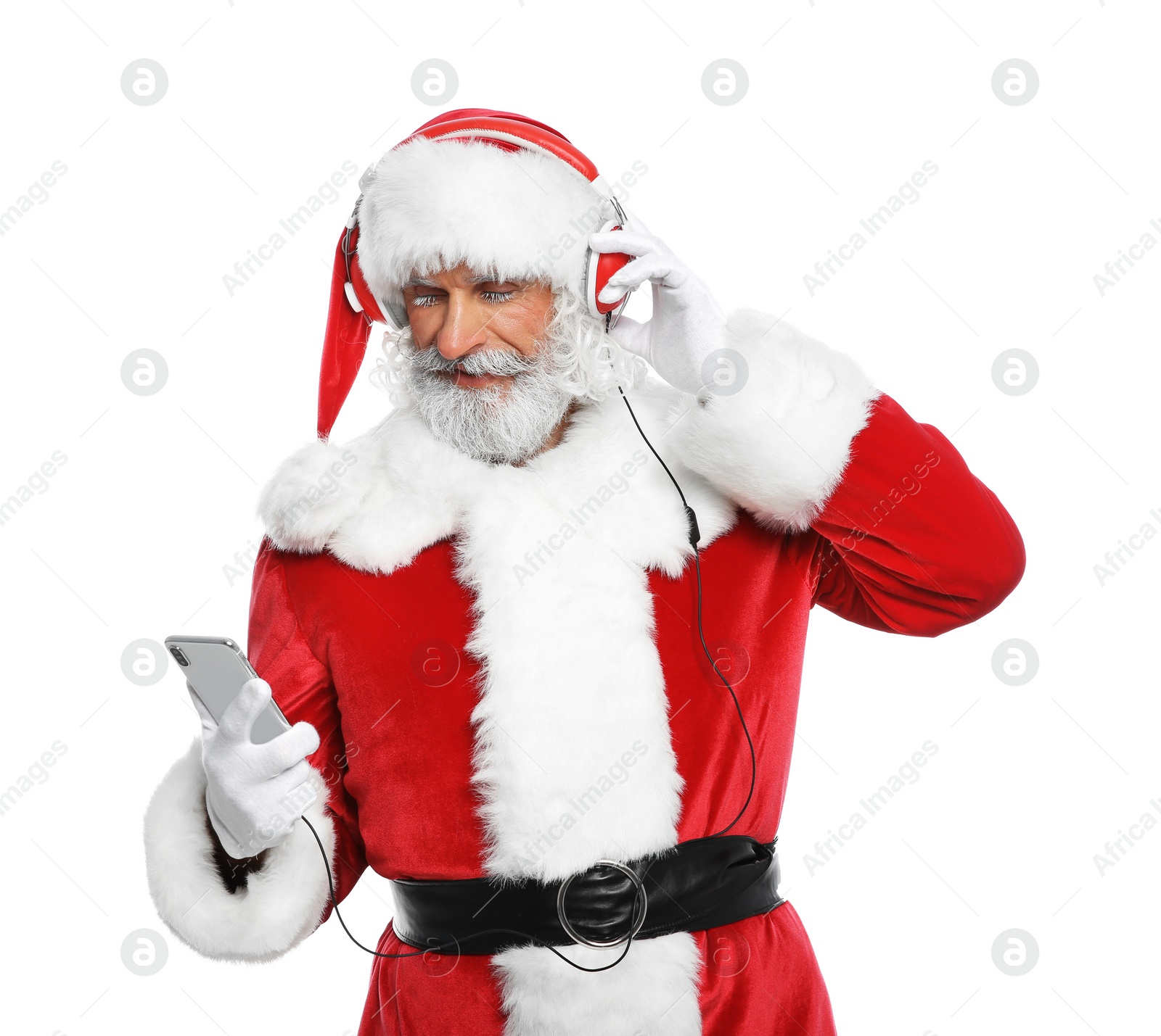 Photo of Santa Claus listening to Christmas music on white background