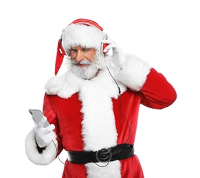 Santa Claus listening to Christmas music on white background