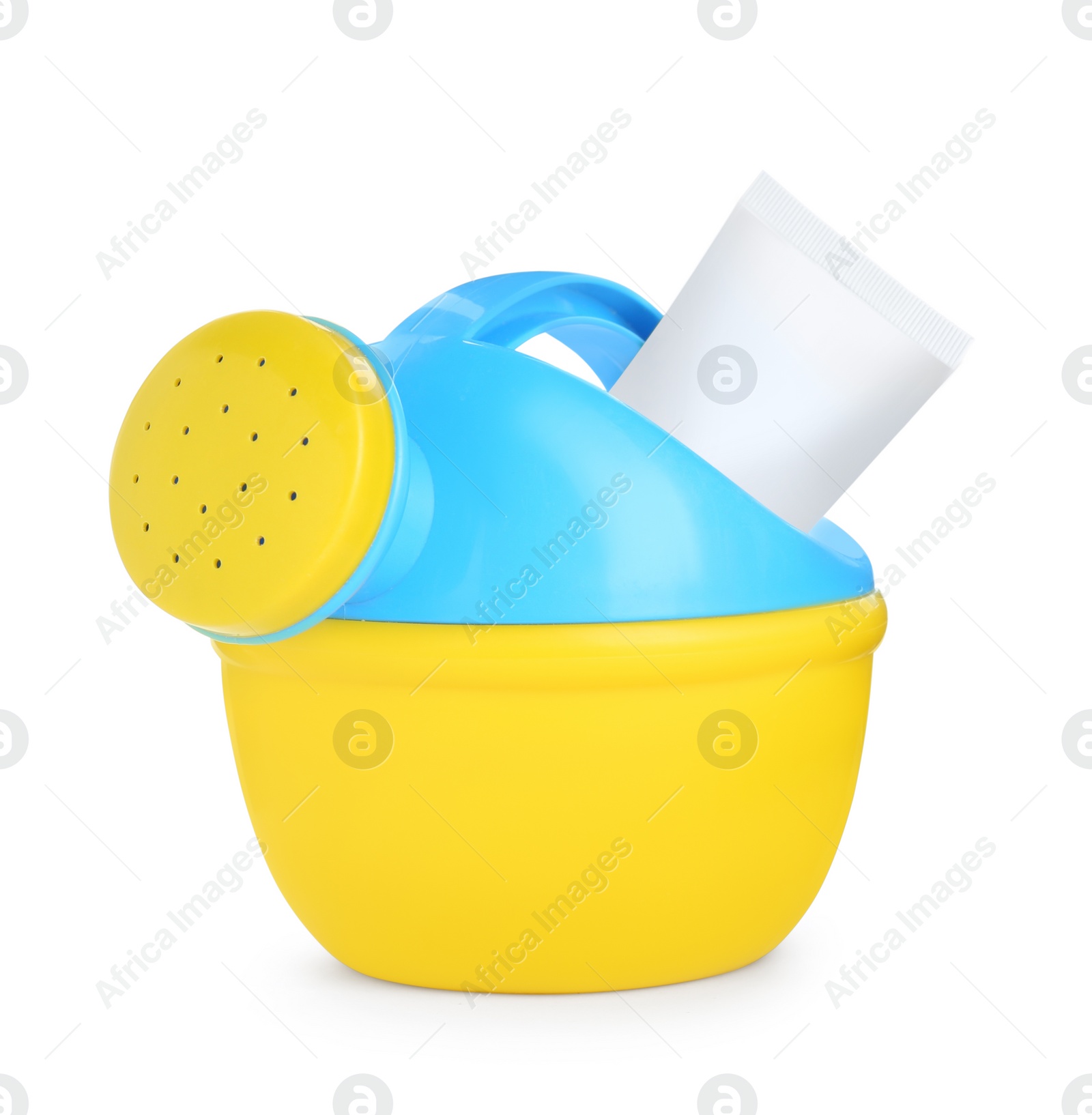 Photo of Suntan product and plastic beach toy on white background