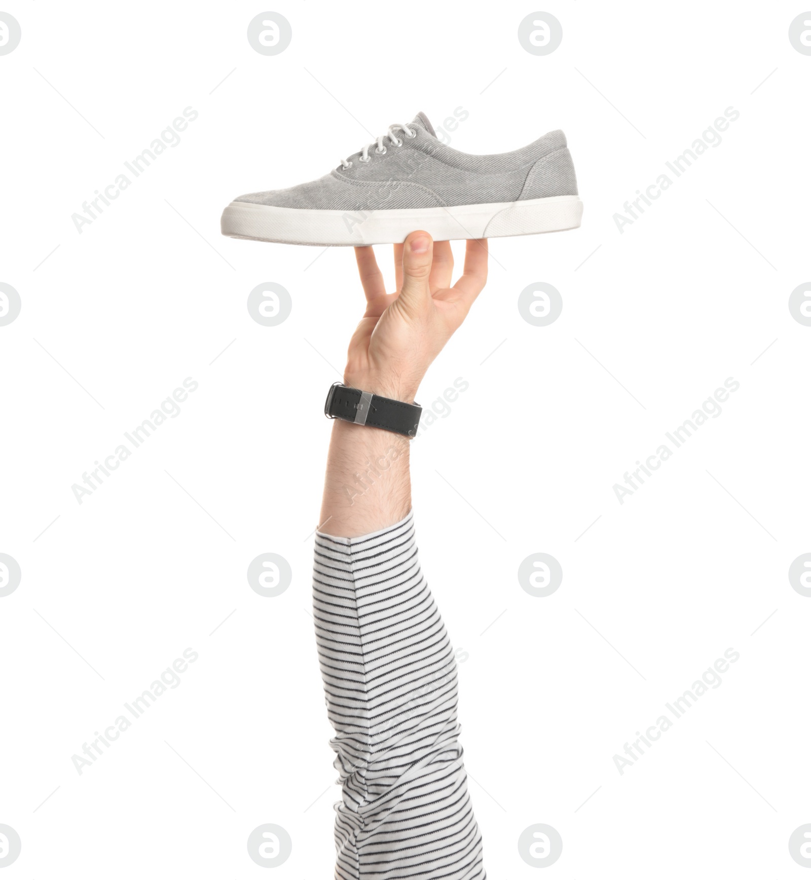 Photo of Man holding stylish shoe on white background, closeup