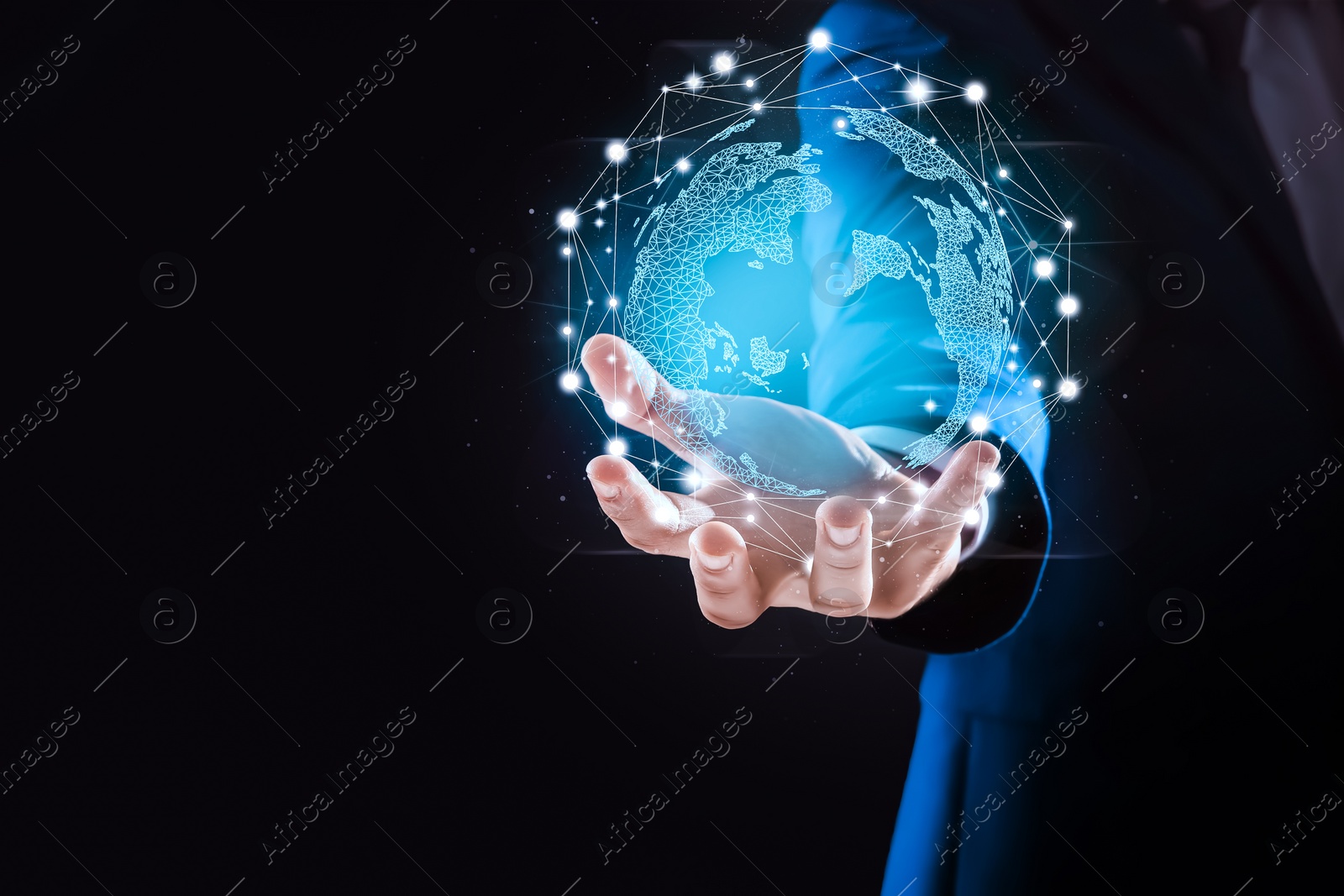 Image of Global innovation. Businessman holding virtual planet on black background, closeup. Space for text
