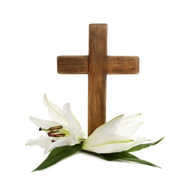 Photo of Wooden cross and blossom lilies on white background