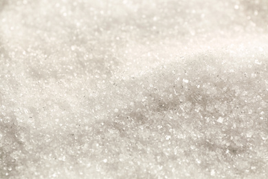 Pile of granulated sugar as background, closeup