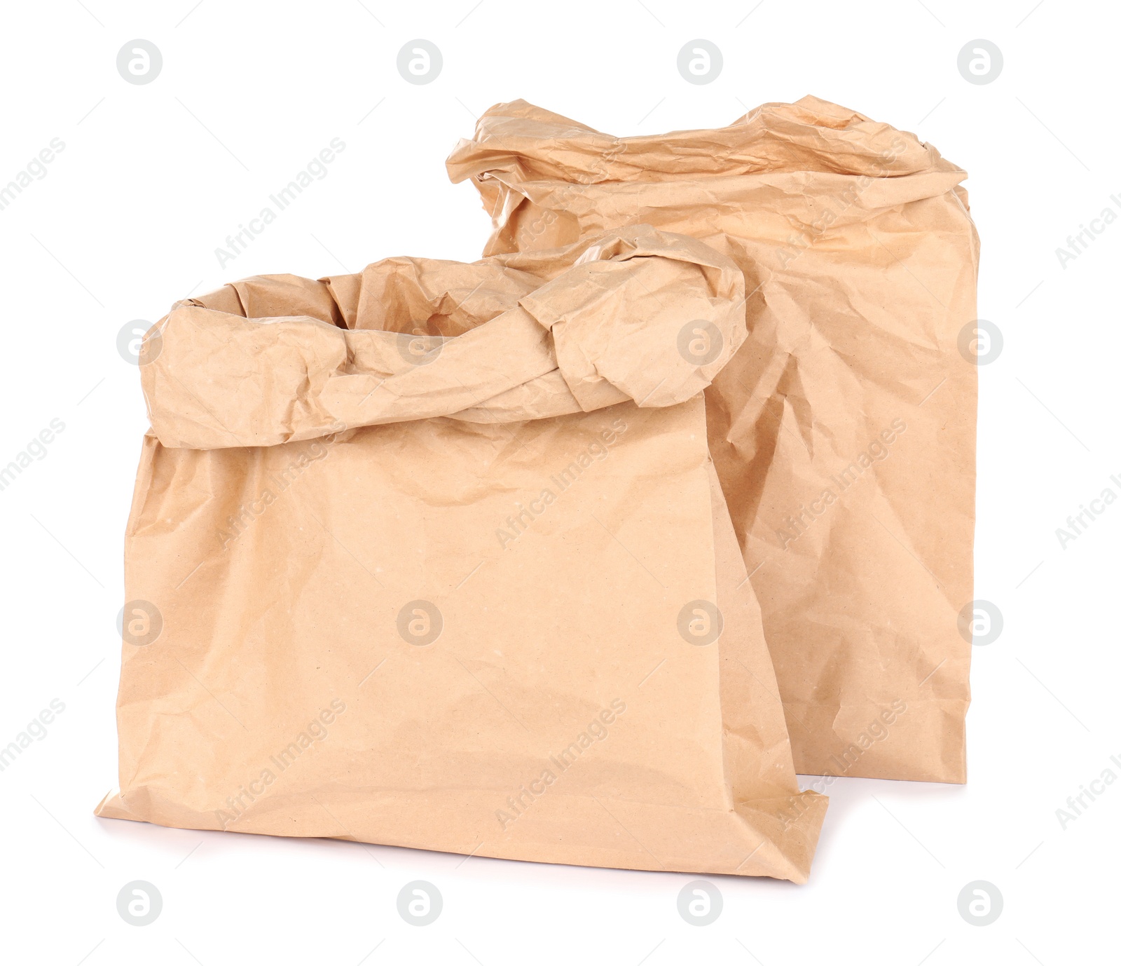 Photo of Paper bags isolated on white. Mockup for design