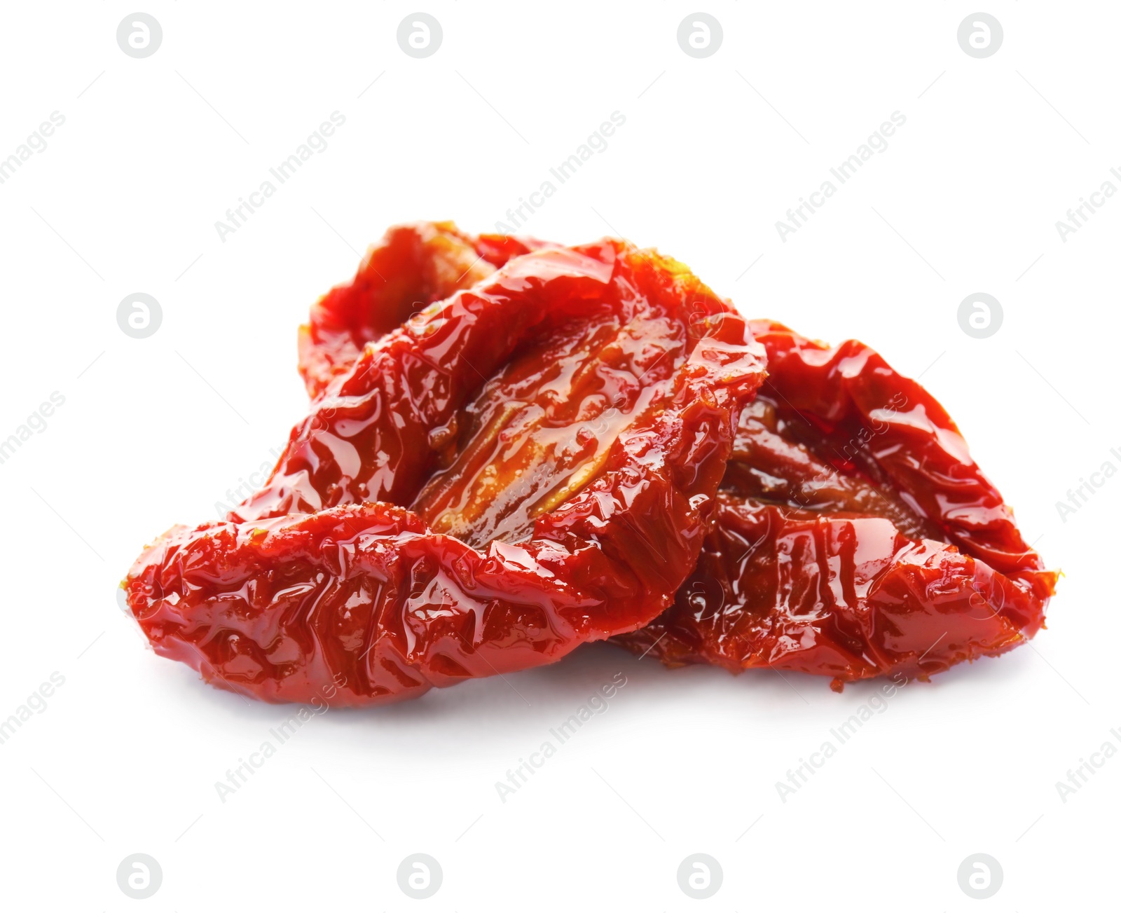 Photo of Tasty sun dried tomatoes on white background