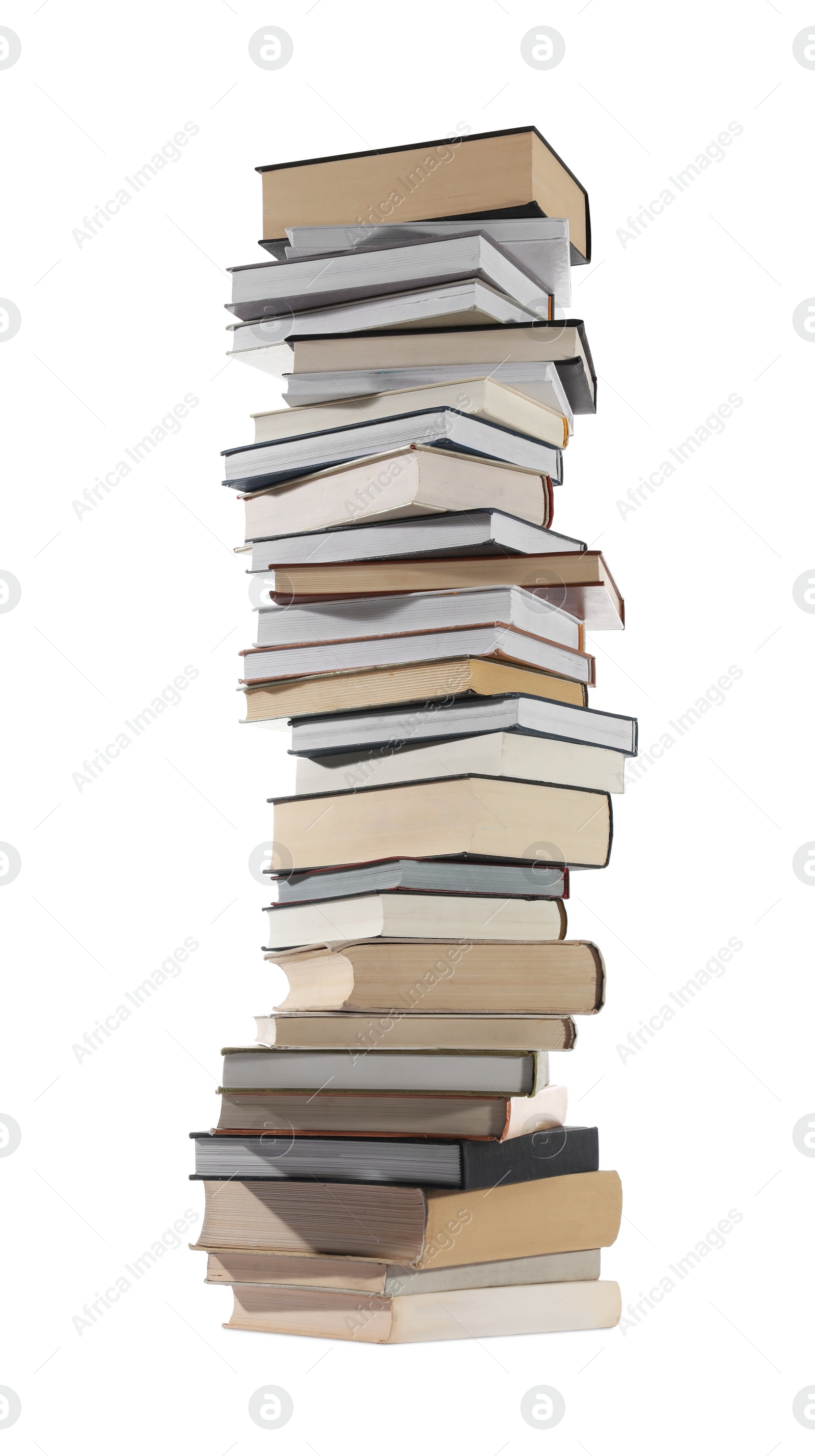 Photo of High stack of many different books isolated on white